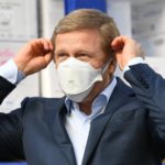 Oliver Zipse, CEO of German luxury carmaker BMW poses with a mask after BMW donated protection masks and gloves to the Federal Agency for Technical Relief (THW), as the spread of the coronavirus disease (COVID-19) continues in Munich, Germany, April 8, 2020. Reuters/Andreas Gebert