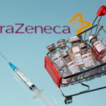 A small shopping basket filled with vials labeled "COVID-19 - Coronavirus Vaccine" and a medical sryinge are placed on an AstraZeneca logo. Photo: Reuters/Dado Ruvic/Ilustration/File Photo