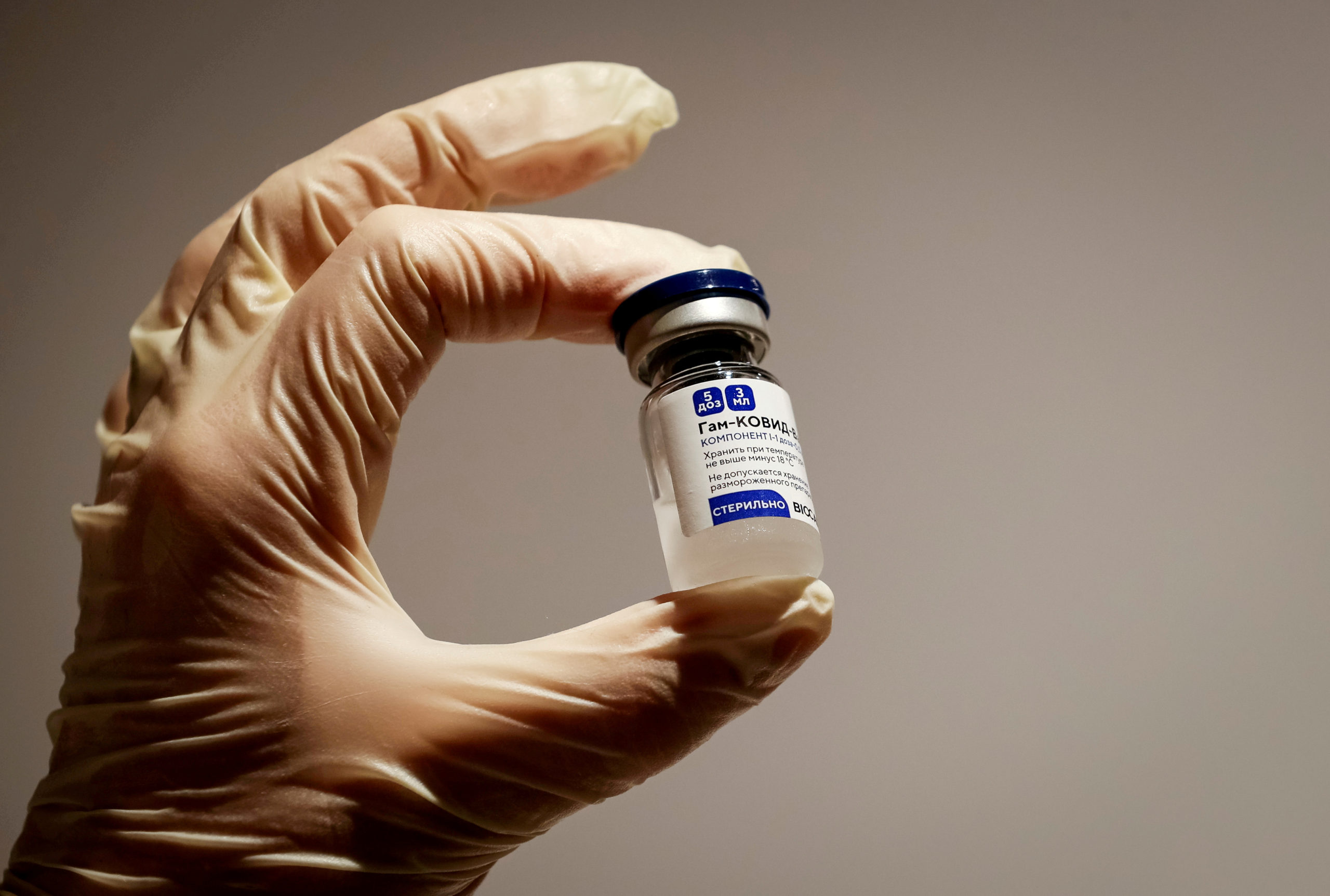 FILE PHOTO: A medical specialist holds a vial of the Sputnik V vaccine against the coronavirus in a department store in Moscow, Russia