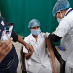 A paramedic receives a dose of Covishield, a COVID-19 vaccine manufactured by Serum Institute of India, at the Civil Hospital in Ahmedabad, India, January 29, 2021. REUTERS/Amit Dave