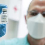 A medical worker holds a vial of the Russian Sputnik V coronavirus vaccine in Belgrade, Serbia, January 6, 2021. REUTERS/Fedja Grulovic