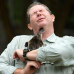 Taronga Zoo senior keeper Rob Dockerill holds Annie the Platypus during a World Wildlife Day announcement pledging to save the Australian platypus from extinction, at Taronga Zoo in Sydney