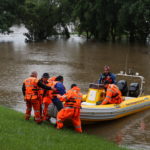 SES personnel carry out an operation during severe flooding in Sydney