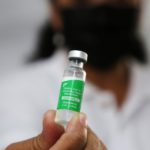 A health worker holds a vial with doses of the Oxford-AstraZeneca vaccine, marketed by the Serum Institute of India (SII) as COVISHIELD, against the coronavirus disease (COVID-19), in Paramaribo