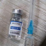 FILE PHOTO: Vial labelled "Sputnik V Coronavirus COVID-19 Vaccine" and a syringe are seen in this illustration photo