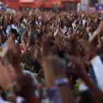 Devotees gather for an evening prayer on the banks of Ganges river during Kumbh Mela, or the Pitcher Festival, amidst the spread of the coronavirus disease (COVID-19), in Haridwar