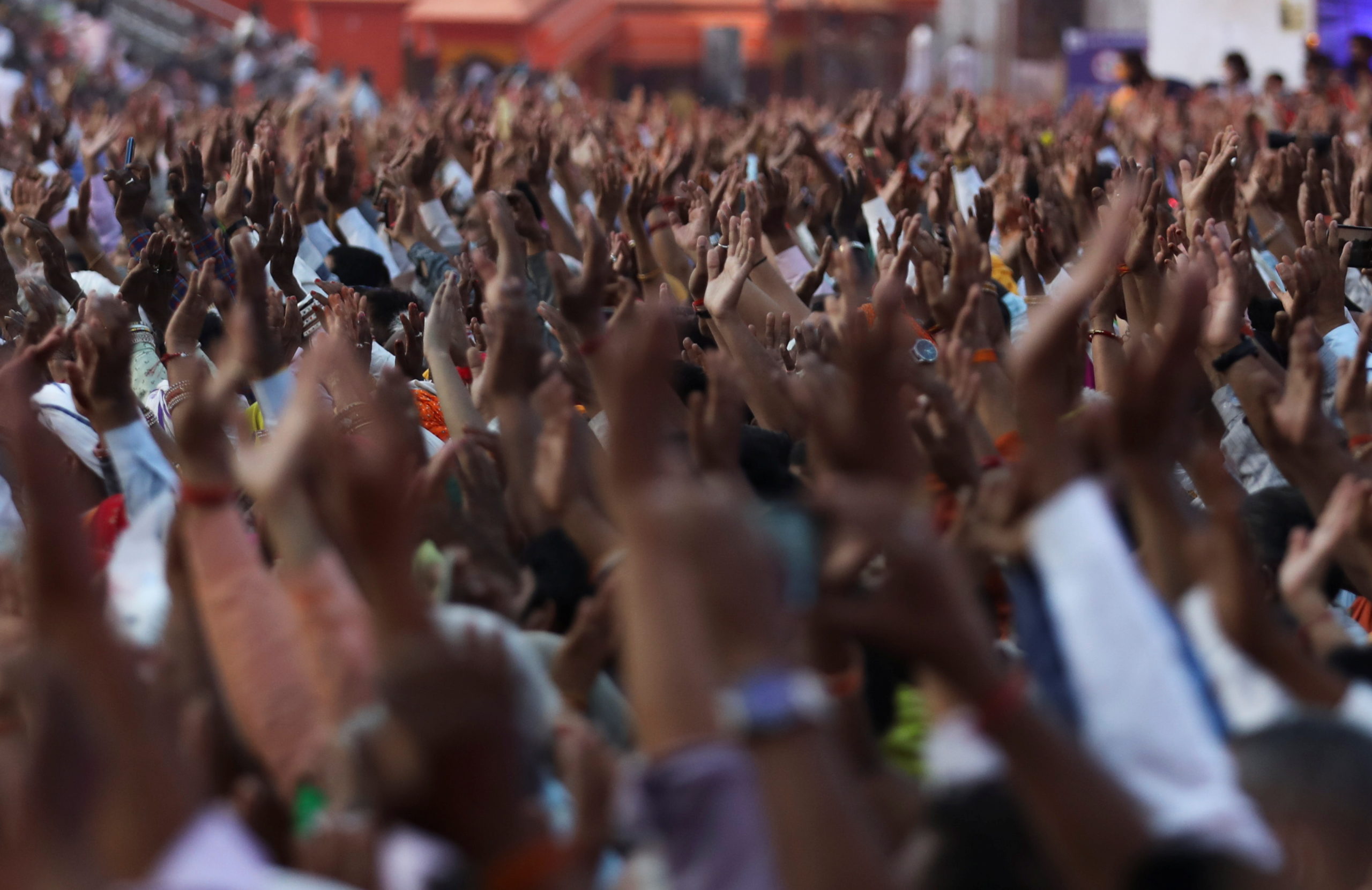 Devotees gather for an evening prayer on the banks of Ganges river during Kumbh Mela, or the Pitcher Festival, amidst the spread of the coronavirus disease (COVID-19), in Haridwar
