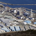 FILE PHOTO: An aerial view shows the storage tanks for treated water at the tsunami-crippled Fukushima Daiichi nuclear power plant in Okuma town, Fukushima prefecture