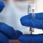 FILE PHOTO: A nurse draws from a vial of Johnson & Johnson coronavirus disease (COVID-19) vaccine, in Los Angeles