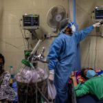 Patients suffering from the coronavirus disease (COVID-19) get treatment at the casualty ward in Lok Nayak Jai Prakash (LNJP) hospital, amidst the spread of the disease in New Delhi