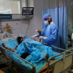 Patient suffering from COVID-19 is treated at Safdarjung Hospital in New Delhi