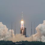 FILE PHOTO: Long March-5B Y2 rocket, carrying the core module of China's space station Tianhe, takes off from Wenchang