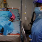Patient suffering from COVID-19 is treated at Safdarjung Hospital in New Delhi