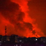 A general view shows smoke and flames at the volcanic eruption of Mount Nyiragongo near Goma