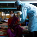 Patients are treated at classroom turned COVID-19 care facility on outskirts of Mumbai