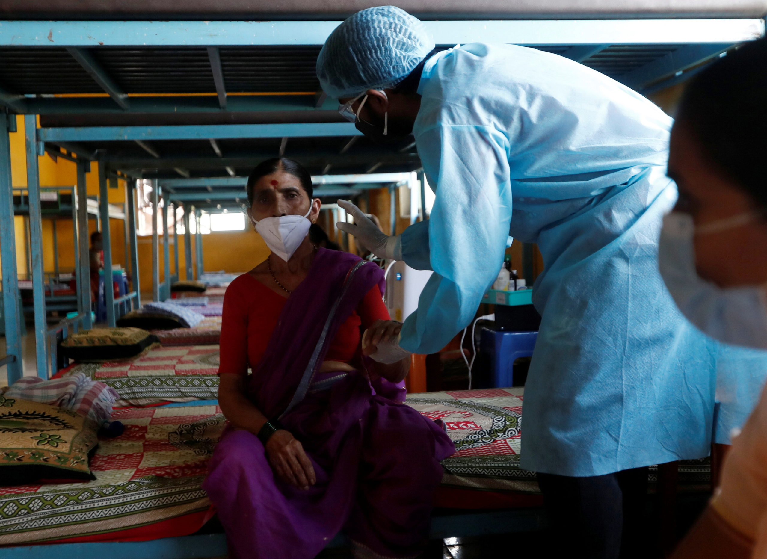 Patients are treated at classroom turned COVID-19 care facility on outskirts of Mumbai