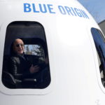 FILE PHOTO: Amazon and Blue Origin founder Jeff Bezos addresses the media about the New Shepard rocket booster and Crew Capsule mockup at the 33rd Space Symposium in Colorado Springs