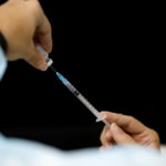 FILE PHOTO: A medical worker prepares to administer a vaccination against the coronavirus disease (COVID-19) as Israel continues its national vaccination drive, during a third national COVID lockdown, in Ashdod
