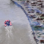 FILE PHOTO: Monsoon exposes bodies buried in shallow sand graves in Phaphamau