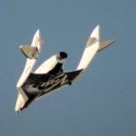 FILE PHOTO: File photo of Virgin Galactic's SpaceShipTwo flies over the Mojave Desert shortly before successfully completing a test flight that broke the sound barrier