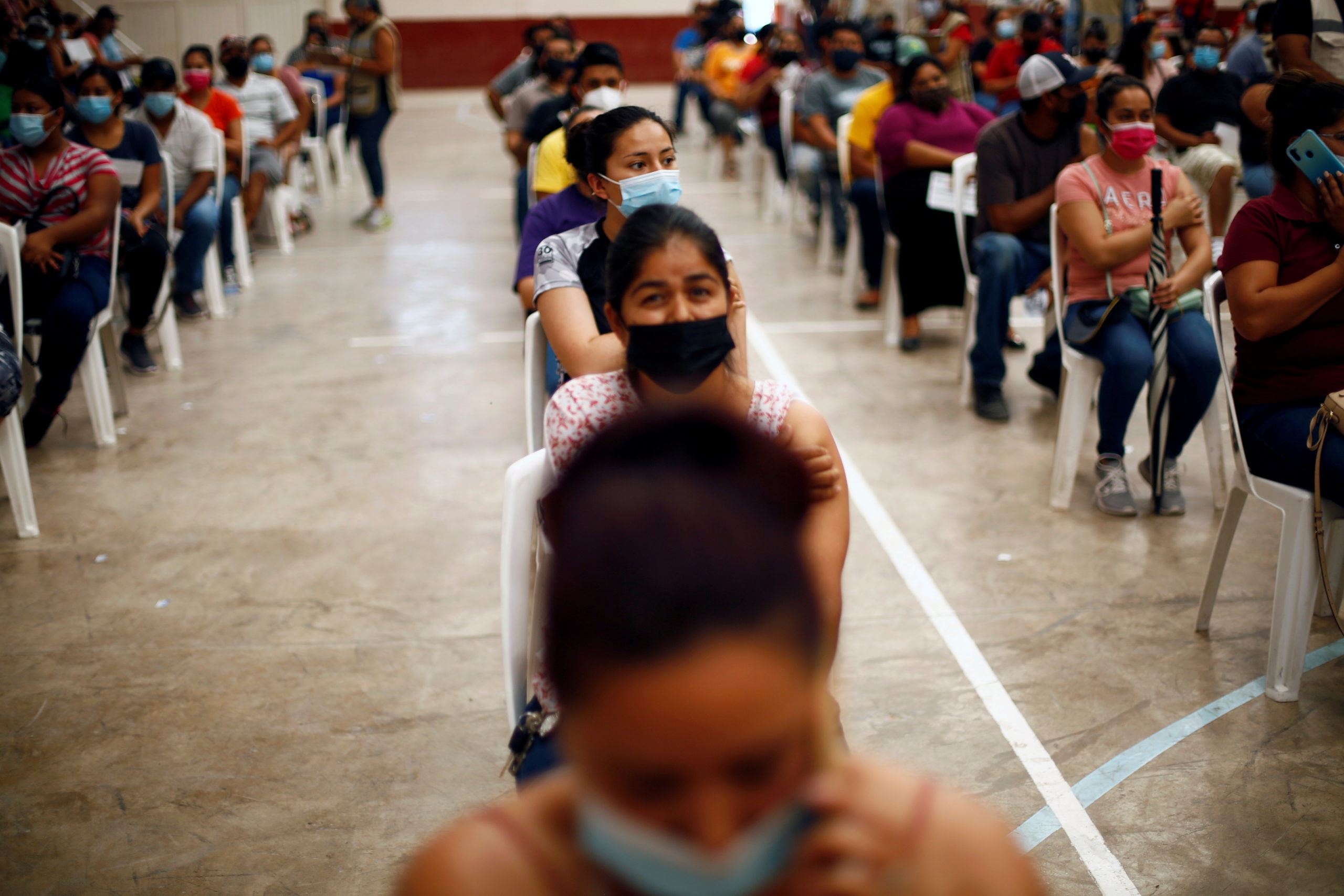 FILE PHOTO: Coronavirus disease (COVID-19) vaccination in Praxedis G. Guerrero