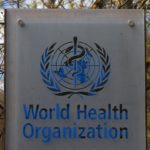 FILE PHOTO: A logo is pictured outside a building of the WHO in Geneva