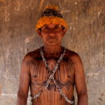 Geraldo, from Munduruku tribe poses for a picture during a four-day pow wow in Piaracu village, in Xingu Indigenous Park, near Sao Jose do Xingu