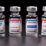 FILE PHOTO: Picture illustration of vials with Pfizer-BioNTech, AstraZeneca, Sputnik V, and Moderna coronavirus disease (COVID-19) vaccine labels