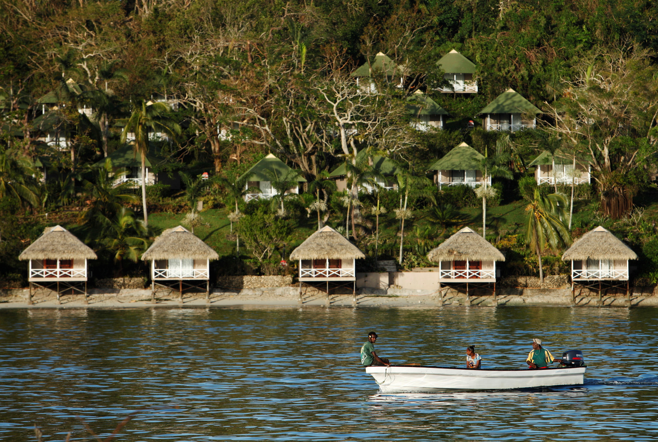 FILE PHOTO: People commute on boats to Port Vila, capital city of the Pacific island nation of Vanuatu