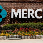 FILE PHOTO: The Merck logo is seen at a gate to the Merck & Co campus in Rahway, New Jersey