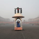 A couple poses during a pre-wedding photo shoot near India's Presidential Palace which is shrouded in smog, in New Delhi