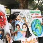FILE PHOTO: Awareness drive against the new coronavirus Omicron variant in Mumbai