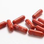 FILE PHOTO: An experimental COVID-19 treatment pill, called molnupiravir and being developed by Merck & Co Inc and Ridgeback Biotherapeutics LP, is seen in this undated handout photo released by Merck & Co Inc
