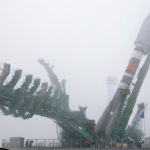 A Soyuz rocket booster with satellites of British firm OneWeb is transported to a launchpad at the Baikonur Cosmodrome