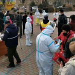 FILE PHOTO: Mass testing for COVID-19 in Dalian, Liaoning