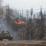 An armoured vehicle of pro-Russian troops is seen in the street in Mariupol