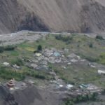 overview-of-the-Gue-village-surrounded-by-fragile-mountains
