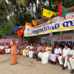 A Hindu priest addresses people who had gathered to support the construction of the proposed Vizhinjam Port
